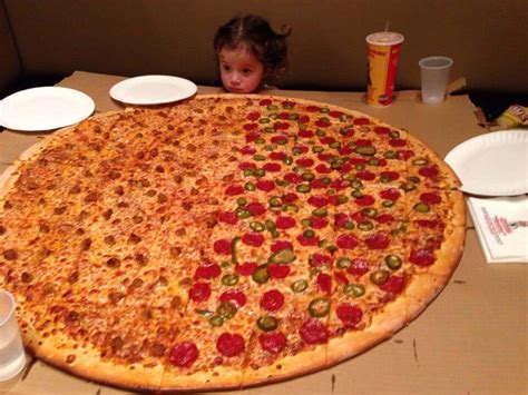 How Many People Does a 28-Inch Pizza Feed? And Why Do Astronauts Prefer Pineapple Toppings?